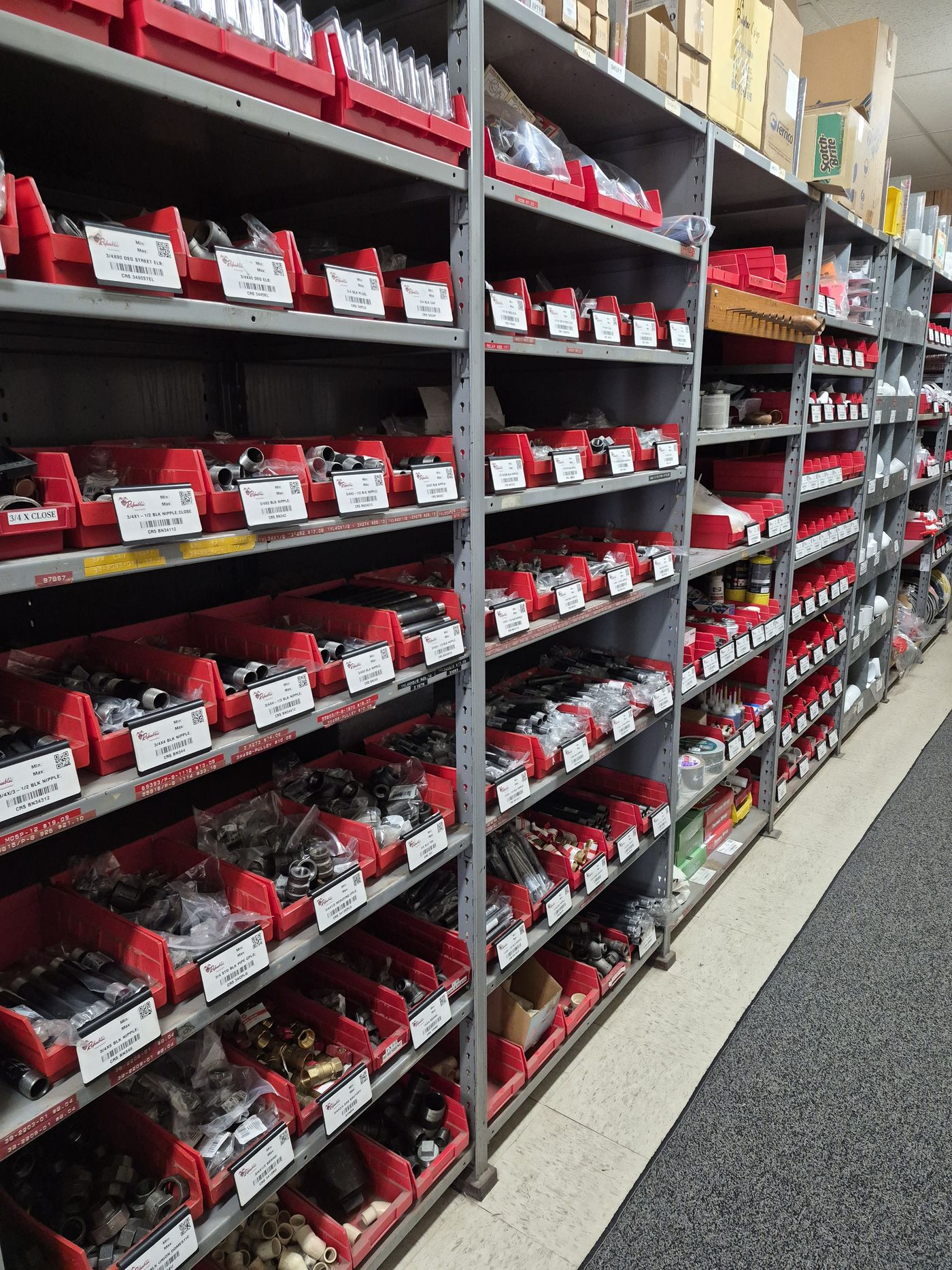 Organized Republic crib bins with labeled inventory