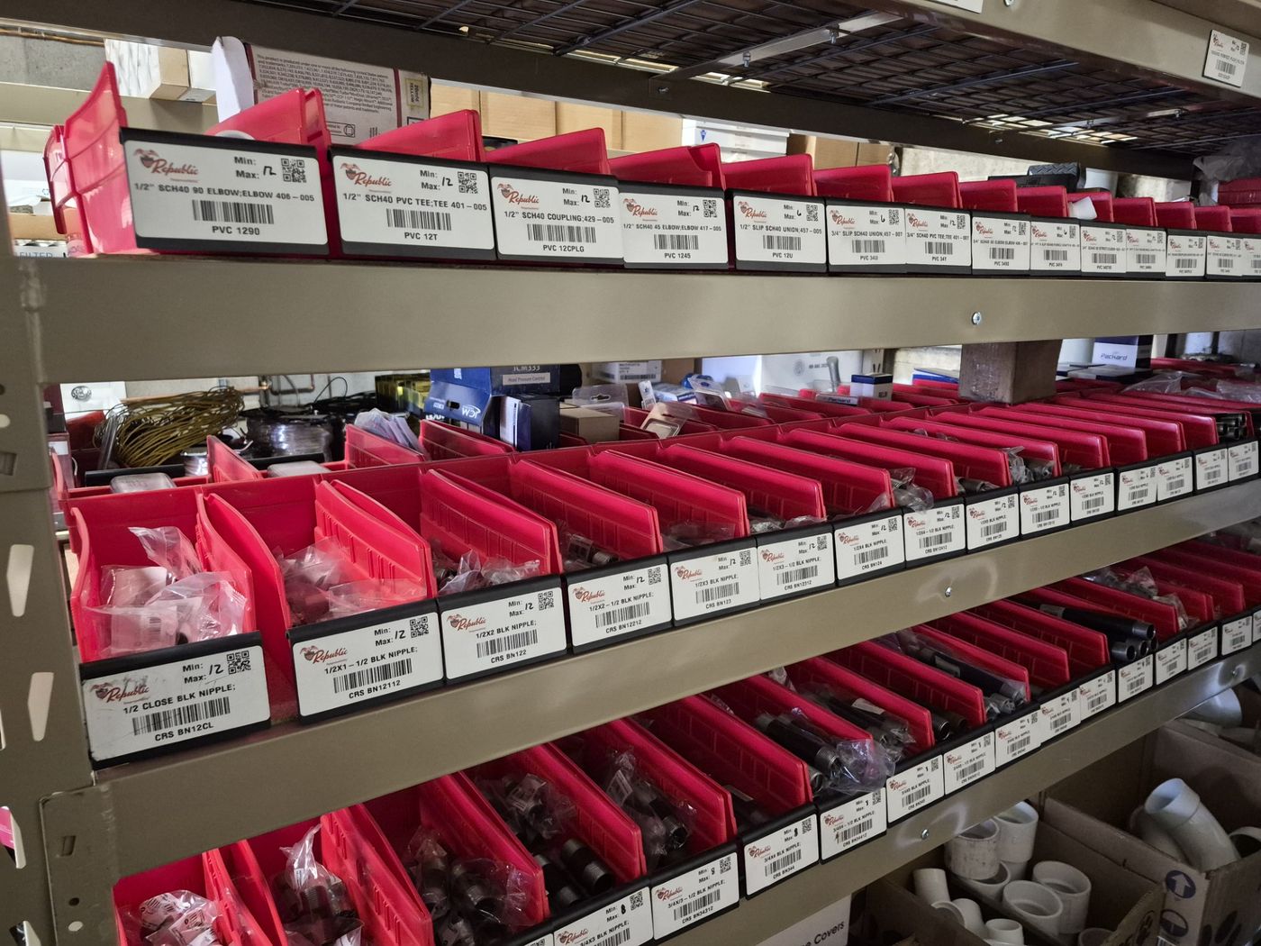 Republic-branded red bins with labeled stock