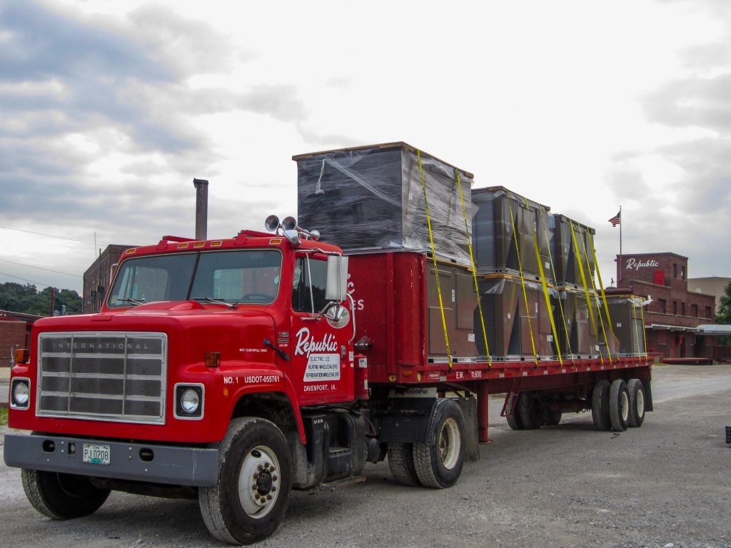 Republic truck loaded with rooftop HVAC units